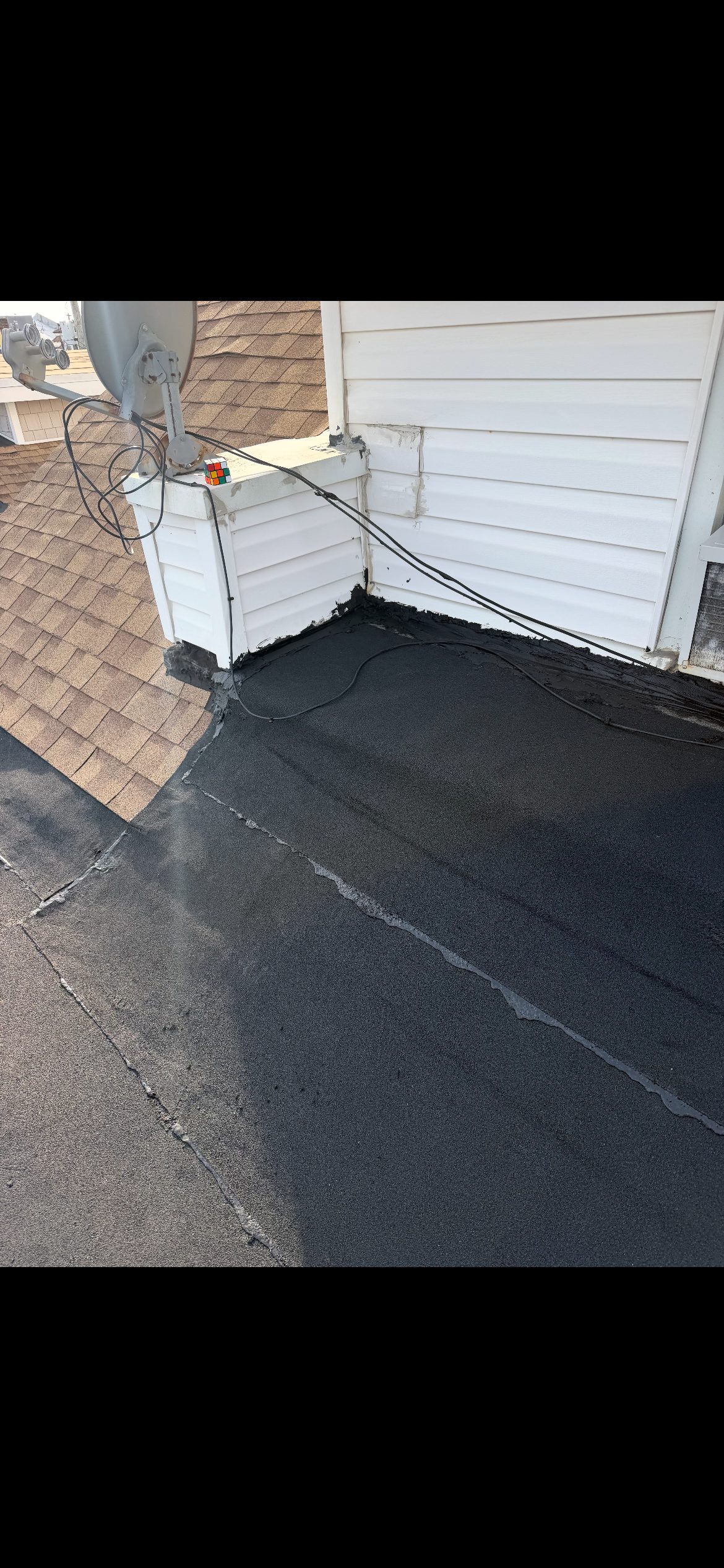 Black granulated rubber roof and downspouts, Ventnor, NJ
